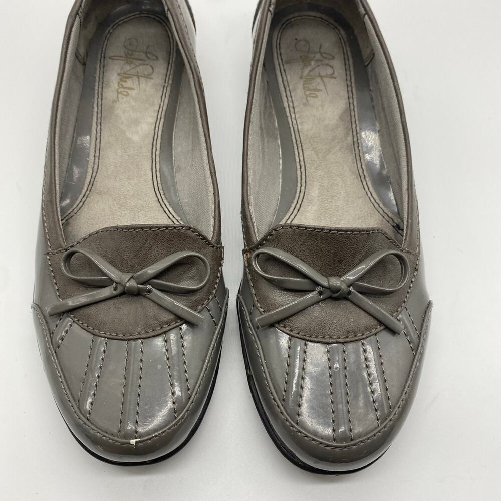 Size 7 1/2 Life Stride slip on’s